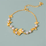 Elegant Gold Ginkgo Leaf & Daisy Bracelet