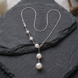 Elegant Necklace with Hanging Pearls