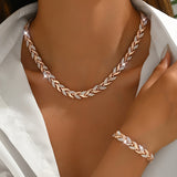 Elegant Fishtail-Shaped Set with Glass & Stones