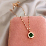 Enameled Emerald Jewelry in Gold