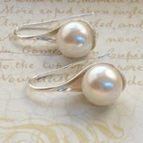 Drop-Shaped Earrings with Daisies