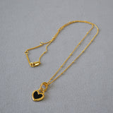 Necklace with Two-Tone Heart Pendant in Gold