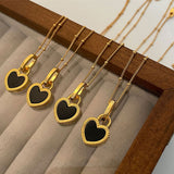 Necklace with Two-Tone Heart Pendant in Gold