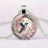 Necklace with Metal Swallow-Shaped Pendant & Glass Dome