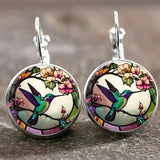 Necklace with Metal Swallow-Shaped Pendant & Glass Dome