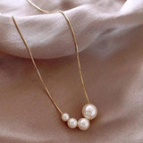 Necklace with Gold Pearls