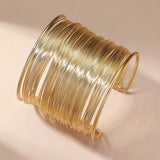 Open Spiral Gold Bracelet