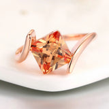 Ring with Orange Precious Stone