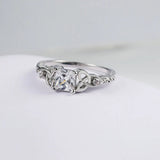 Ring with Knot & Precious Stone in Center