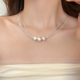 Layered Necklace with White Pearls