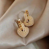 Gold Earrings with Love Pearls