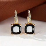 Gold Earrings with Mysterious Stones