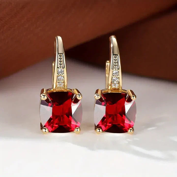 Gold Earrings with Mysterious Stones