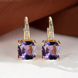 Gold Earrings with Mysterious Stones