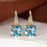 Gold Earrings with Mysterious Stones