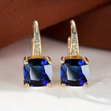 Gold Earrings with Mysterious Stones