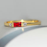 Gold & Shimmering Ring with Red Central Stone