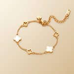 Lucia Clover Bracelet on champagne lunar background