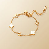 Lucia Clover Bracelet on champagne lunar background